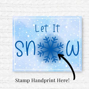 May include: A blue and white watercolor background with snowflakes and the text "Let It Snow". An arrow points to a snowflake with a space below for a handprint. The text "Stamp Handprint Here!" is below the arrow.