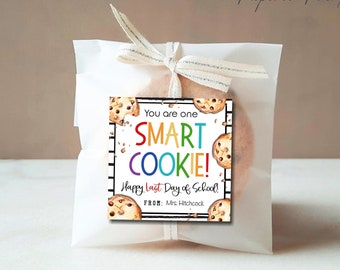 May include: A printable gift tag with a colorful design featuring the text "You are one SMART COOKIE!" and "Happy Last Day of School!" with a space for a teacher's name. The tag is decorated with images of chocolate chip cookies.