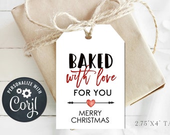 May include: A white gift tag with black text that reads "BAKED with love FOR YOU" with a red heart and black arrow. The text "MERRY CHRISTMAS" is below the heart and arrow. The tag is 2.75 inches by 4 inches.