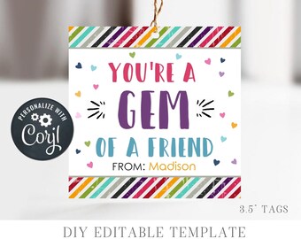May include: A printable gift tag with a colorful striped border and hearts. The text reads "You're a GEM of a friend" with the words "From: Madison" below. The tag is 3.5 inches wide.