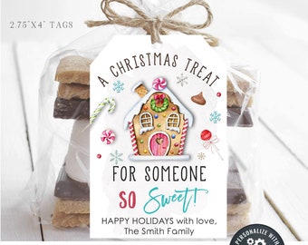 May include: A printable gift tag featuring a gingerbread house illustration with candy canes, snowflakes, and the text "A Christmas Treat for Someone So Sweet! Happy Holidays with love, The Smith Family".