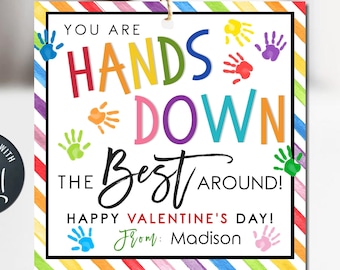 Puede incluir: Una etiqueta de regalo colorida para el Día de San Valentín con el texto "You are hands down the best around! Happy Valentine's Day! From: Madison" y diseños coloridos de huellas de manos.