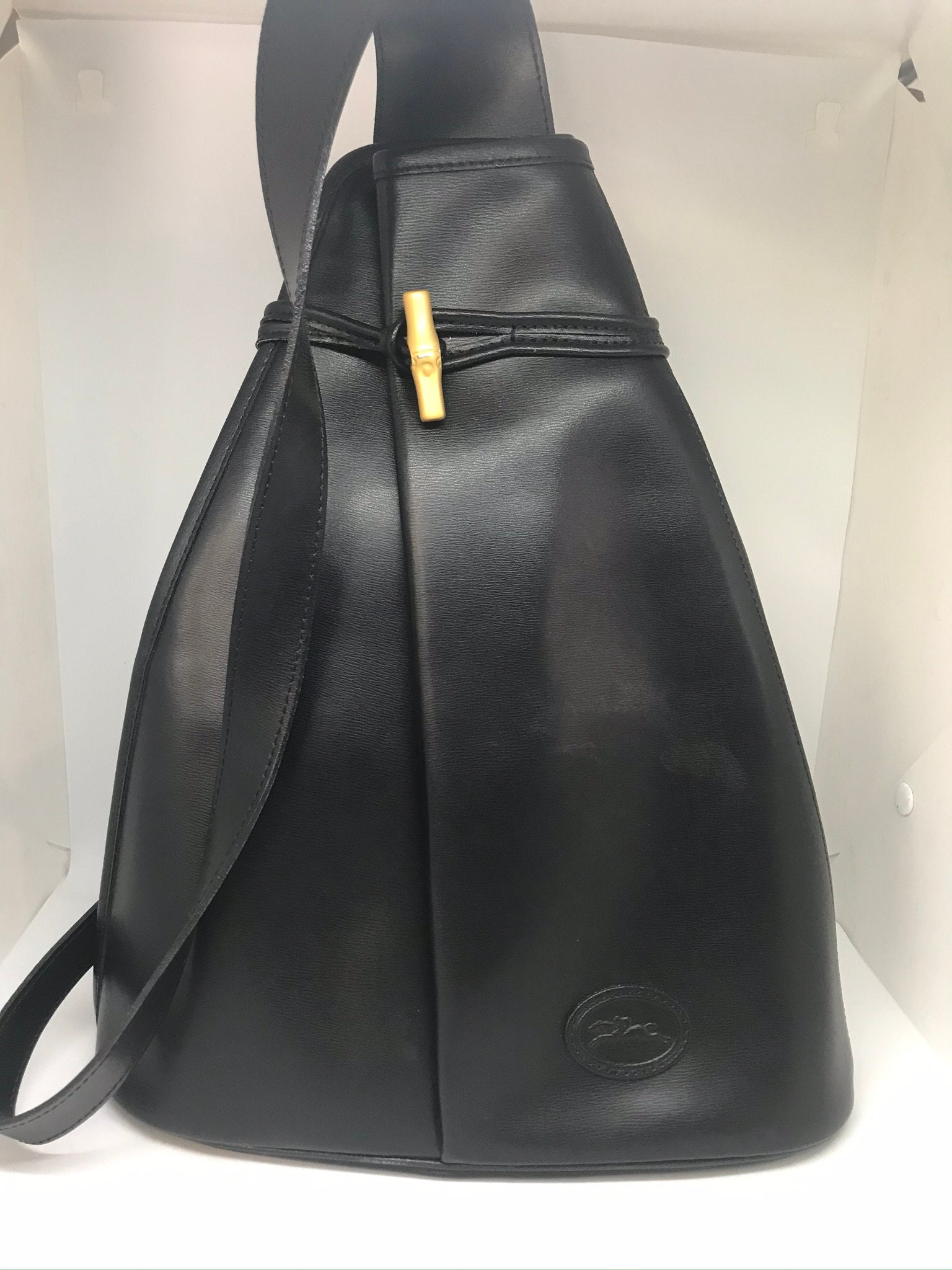 Longchamp Vintage Roseau Leather Sling Backpack One strap Authentic, black  leather, crossbody, 3 size adjustments