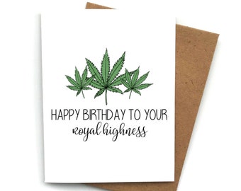 May include: A white card with a green marijuana leaf design and the text "Happy Birthday to your royal highness".