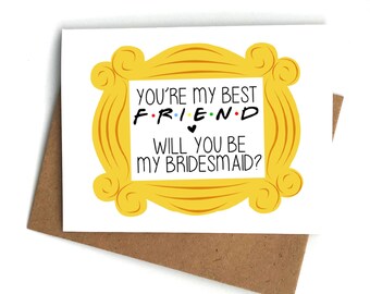 May include: A white card with a yellow frame around the edges. The frame has the words "You're my best F.R.I.E.N.D. Will you be my bridesmaid?" inside.
