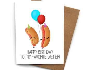 May include: A birthday card with a funny illustration of two hot dogs holding balloons. The text on the card reads "Happy Birthday to my favorite Weiner!"