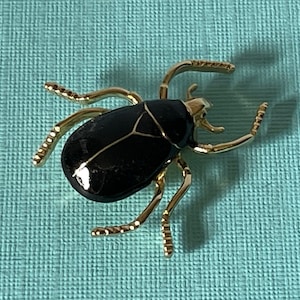 Black beetle brooch, gold beetle pin, black roach pin, insect pin, enamel bug pin, black roach pin, gold and black beetle pin, insect pins