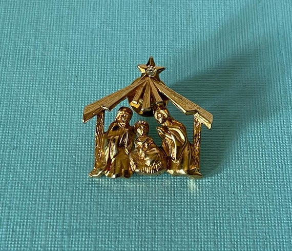 nativity brooch