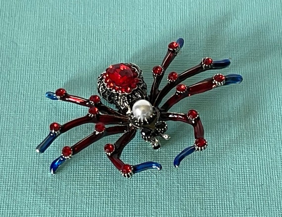 Red rhinestone spider pin, blue rhinestone spider… - image 1