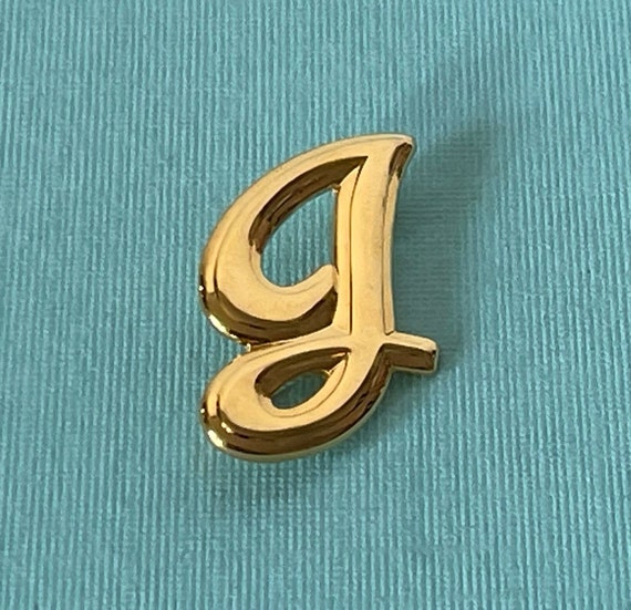 LOUIS VUITTON MONOGRAM jacket pin Golden Metal ref.193831 - Joli Closet