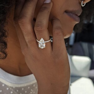 3.30 Carat Pear Shape Lab-grown Diamond Engagement Ring, 14K Yellow Gold with Pave and Hidden halo Ring