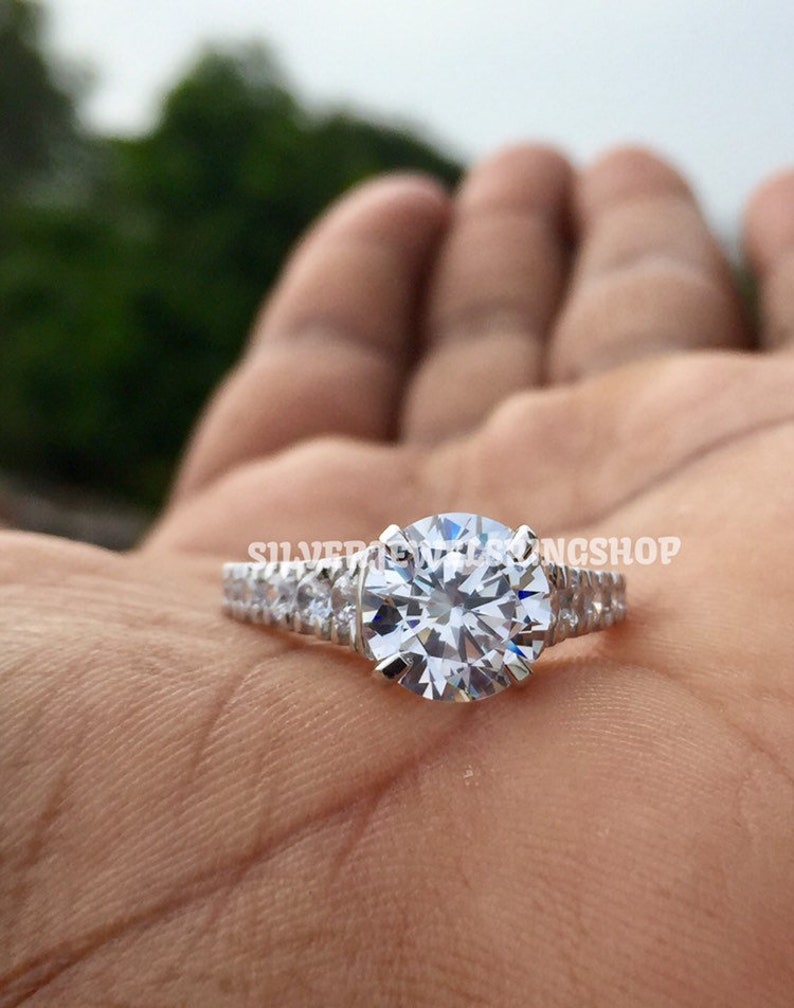 Art Deco Round Cut Moissanite 925 Sterling Silver Engagement Ring 0.80 Ct Art Deco Round Cut Moissanite 925 Sterling Silver Engagement Ring 0.80 Ct