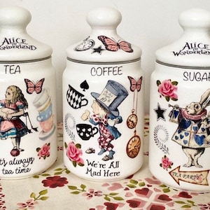 Alice in wonderland mad hatters tea party tea coffee sugar jars Kilner canister set