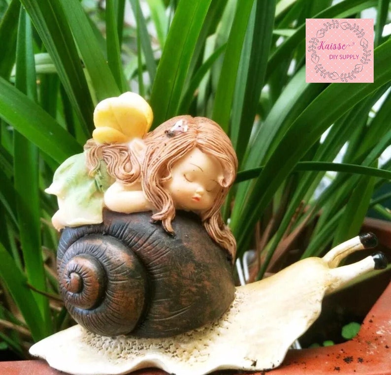 Miniature fairy garden supply Garden Miniature Cute baby sleeping on the snail