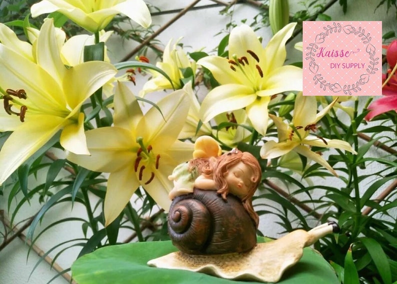Miniature fairy garden supply Garden Miniature Cute baby sleeping on the snail