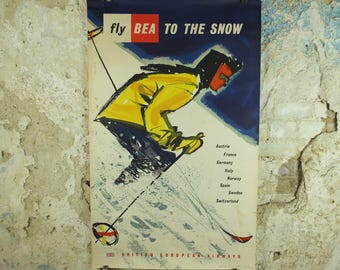 1957 BEA Snow Travel Poster, British European Airlines, Andre Amstutz, skier down a powdery white mountain, airline travel wall art decor