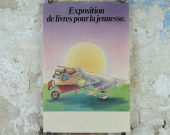 1979 Children's book exhibition Poster, pelican with books in bill and wheelbarrow by Gerard Jouannet, wall art decor
