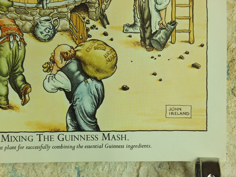 May include: A vintage illustration depicts the process of mixing Guinness mash. A man carries a sack labeled "Best Malt" on his back. Other figures are shown near a stone structure. The artwork is signed "John Ireland".