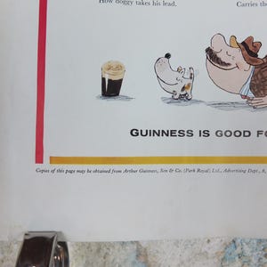 May include: A vintage Guinness advert with a cartoon illustration. The image shows a pint of Guinness, a dog, and a man in a suit. The text "GUINNESS IS GOOD FOR YOU" is displayed. The advert is on a white background.