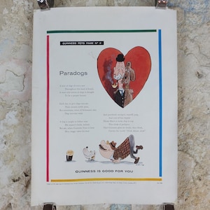 May include: A vintage print from Guinness Pets Page No. 2, showcasing a cartoon illustration. The design features a heart shape with a man and dog, and the title "Paradogs." The text "Guinness is Good for You" is at the bottom of the print.