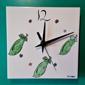 Pea Clock. A tile wall clock with pea decoration and a battery quartz movement