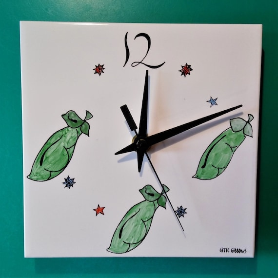 Pea Clock. A tile wall clock with pea decoration and a battery quartz movement