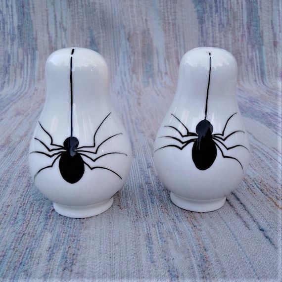 Spider salt and pepper cruet set.