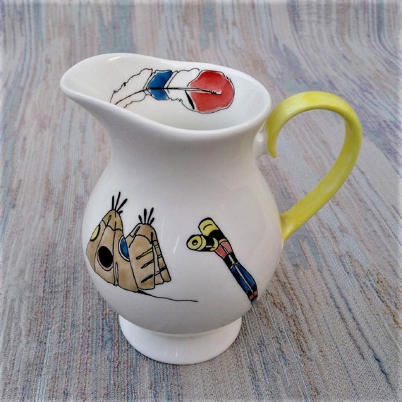 Half pint jug with Native American items.