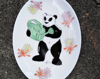 Panda gardening on oval dish in white bone china hand decorated