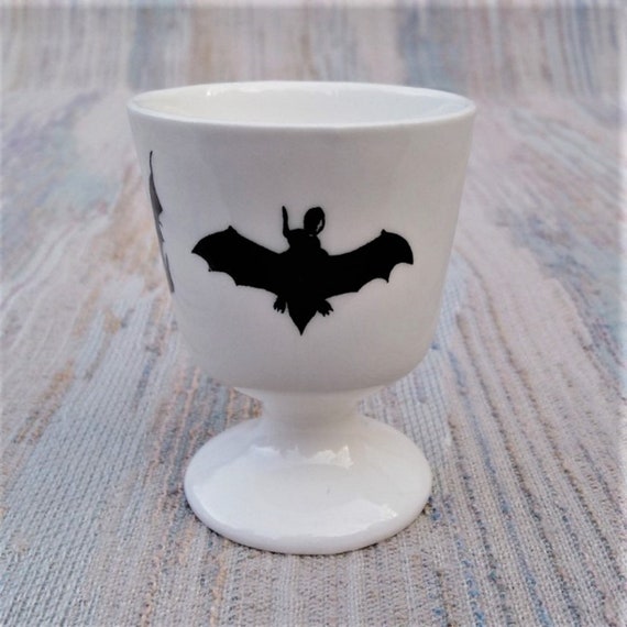 Egg cup with bat design