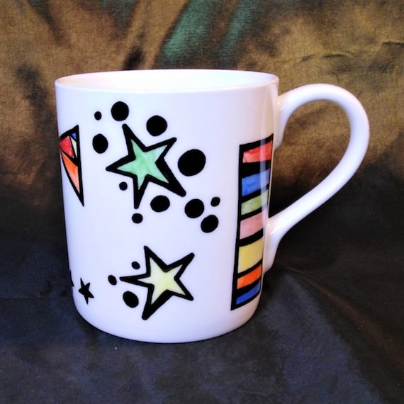 Bright and colourful abstract pattern on this bone china mug.