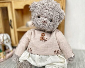 Petit ours ancien en peluche et articulé aux bras, jambes et tête