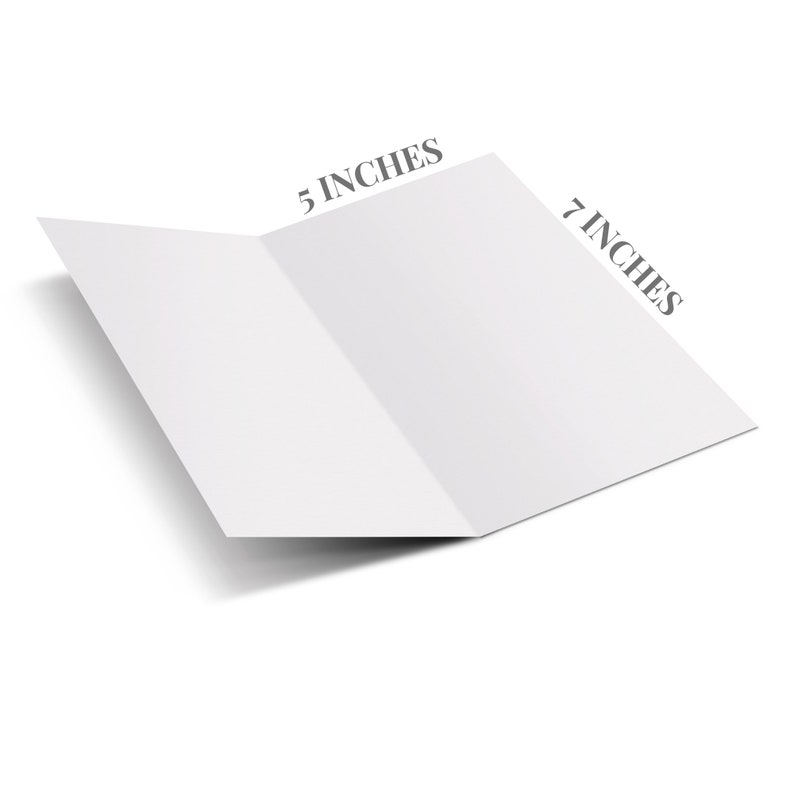 May include: A blank white card folded in half, measuring 7 inches by 5 inches. The card is lying flat on a white surface.
