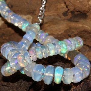 9 Strands of AAAA Rainbow Flash Ethiopian Opal Smooth Beads | Etsy
