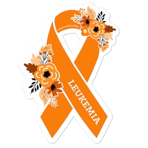 May include: Orange ribbon with floral accents and the word "LEUKEMIA" written on it.