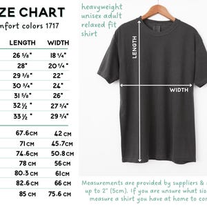 May include: Size chart for a heavyweight unisex t-shirt with relaxed fit. The chart shows measurements in inches and centimeters for sizes S through 4XL.