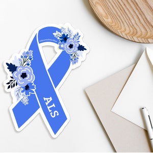 May include: Blue ribbon with a floral design and the word "ALS" in white lettering. The ribbon is a symbol of awareness for Amyotrophic Lateral Sclerosis.