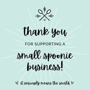 May include: A light blue background with white rays emanating from the centre. The text "thank you for supporting a small spoonie business!" is in black cursive font. Below the text is a heart symbol and the text "it seriously means the world" in smaller font.