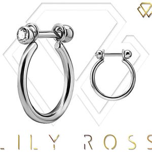 片側にスワロフスキーの宝石がちりばめられた CZ マイクロバーベル 16GA チタンコンクリング。11 mm から 14 mm (1.2 x 0.7 mm バー) まであります。