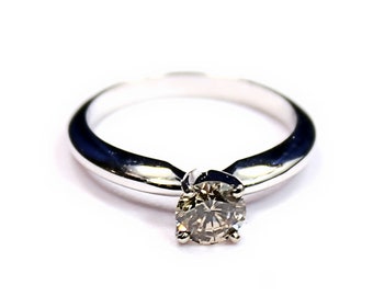 Striking 14K White Gold .60 Carat Champagne Round Cut Diamond Ring