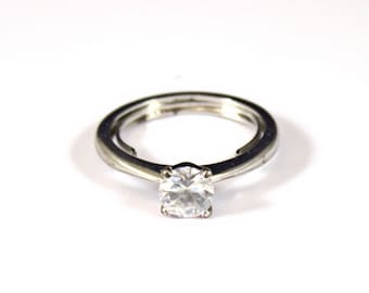 Eye Catching Design CZ set in Silver Tone Ring Size 8 (Expandable)
