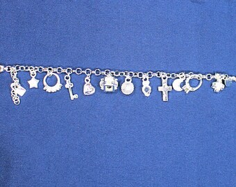 Exquisite .925 Sterling Silver Plated 13 Charm  Bracelet