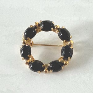 Vintage Circular Gold-Tone Brooch with Black Stones (70’s)