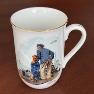 Norman Rockwell Mug- “Looking Out To Sea”