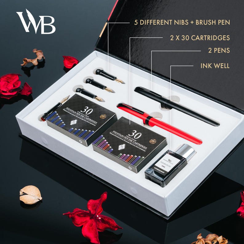 May include: A fountain pen gift set in a white box with a black interior. The set includes two pens, ink cartridges, an ink well, and five nibs. One pen is black, the other is red. The box has the text "5 DIFFERENT NIBS + BRUSH PEN".