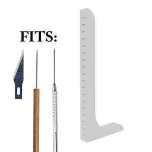 May include: An assortment of craft tools, including a blue utility knife blade, a wooden-handled awl, a silver-handled awl, and a gray L-shaped ruler. The word "FITS:" is displayed in bold black text.