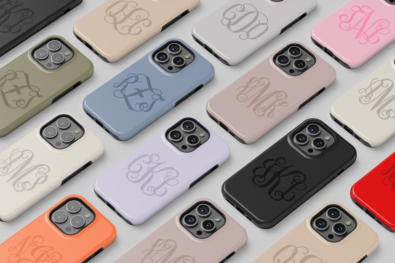 May include: A variety of phone cases with different colors and monogram designs. The cases are all for the same model phone and have a raised camera bump.