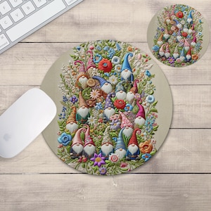 May include: A round mousepad with a whimsical design featuring a group of gnomes surrounded by colorful flowers. The gnomes are wearing pointed hats and have long white beards. The background is a light beige color.