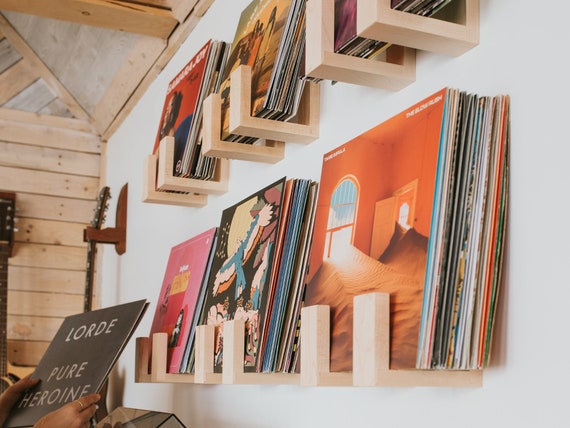 Flip record display on sale shelves