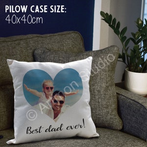 May include: White pillowcase with a heart-shaped photo of a father and daughter. The photo shows the father holding the daughter on his shoulders as she has her arms outstretched. The text "Best dad ever!" is printed below the photo. The pillowcase is 40x40cm.